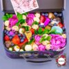 Сладости, ягоды и цветы в чемодане